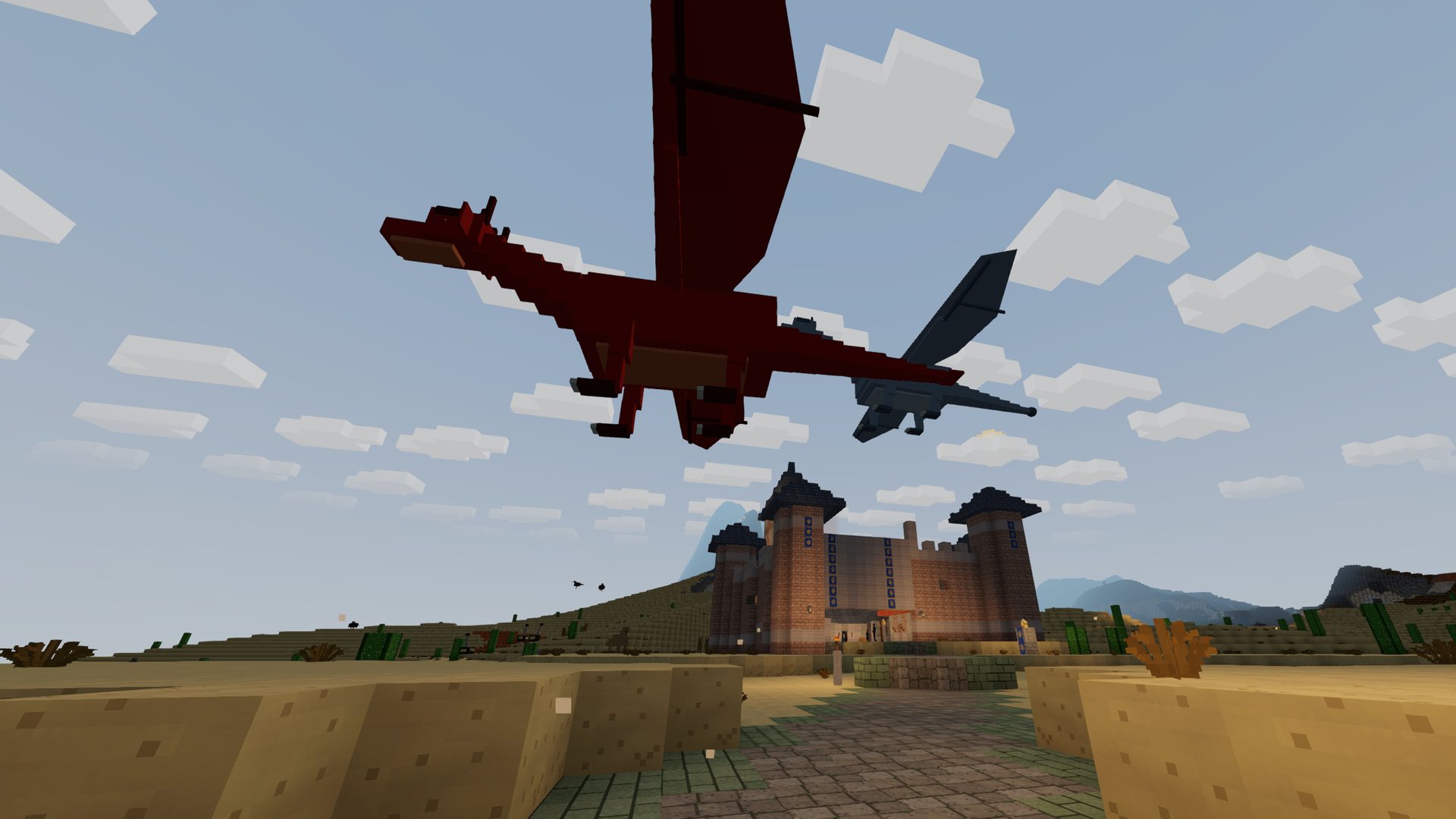 Two dragons flying low over the road to a bastion
